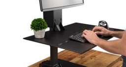 Sit, stand, and enjoy more comfortable work with the E7 Electric Standing Desk Converter
