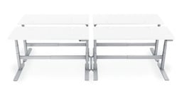 Bench together multiple UPLIFT V2 2-leg desks to keep desks straight and organized