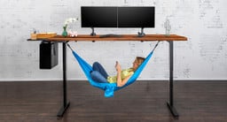 Attach the Under Desk Hammock to V2 desks that are at least 72" wide to enjoy your desk in a whole new way