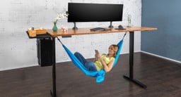 Compatible accessories like the Under Desk Hammock attach to V2 frames that are 72 inches and larger