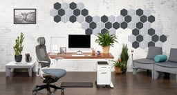 60" x 30" Walnut Laminate Adjustable Height Desk with Hive Acoustic Wall Tiles, 2-Drawer Narrow File Cabinet, Pursuit Ergonomic Chair, and SoCo Lounge Furniture 