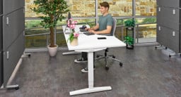 The Curved Corner Standing Desk is designed to provide a spacious desktop with a smaller footprint than other corner desks