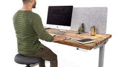 60" x 30" Acacia Solid Wood desktop  on a gray UPLIFT V2 Standing Desk Frame