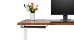 White UPLIFT Desk Frame with matching Slim Under Desk Shelf