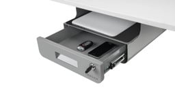 Store mobile devices, keys, wallet, and more in the drawer, then lock it