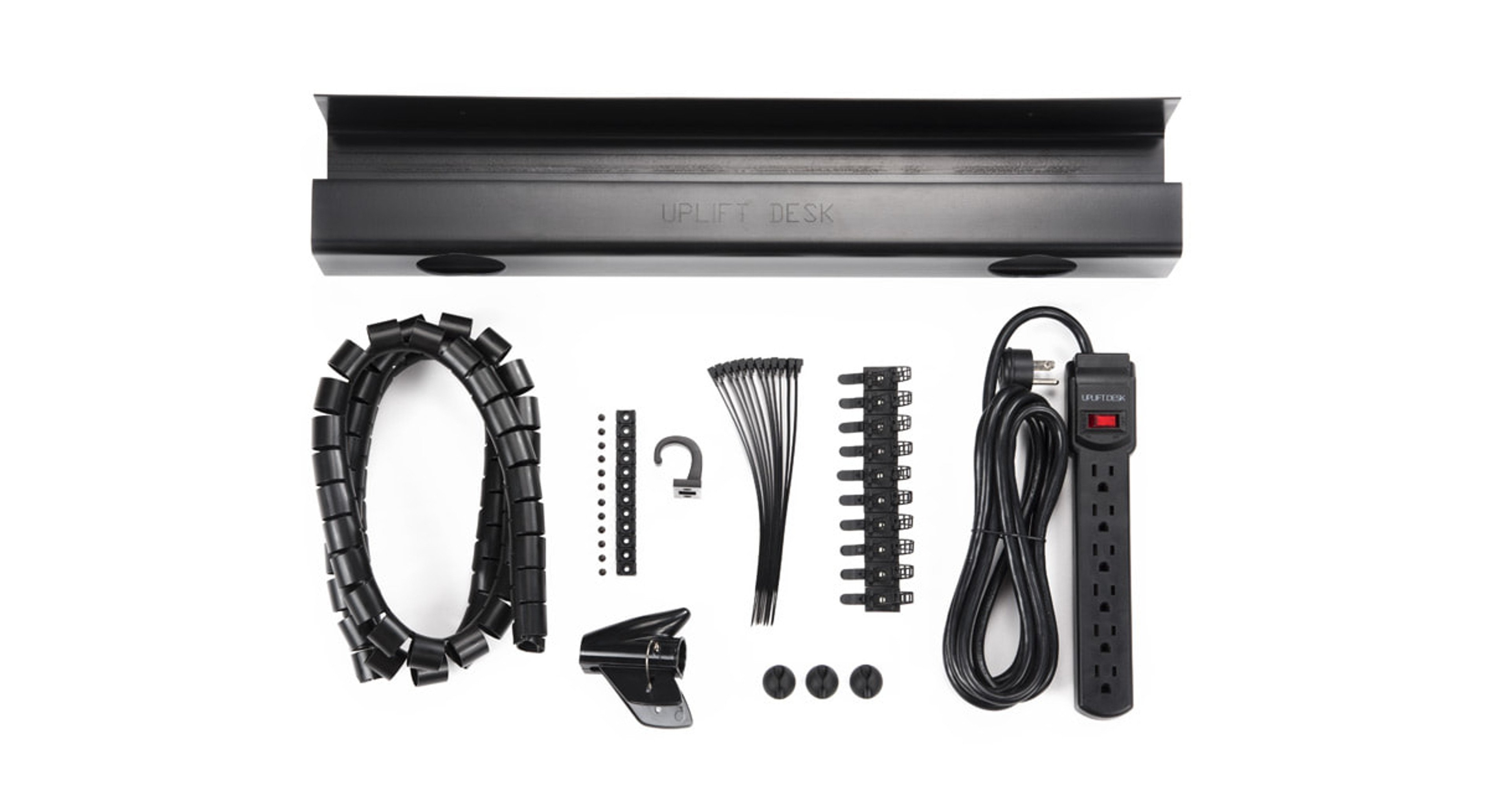 Includes tray, 6-outlet surge protector, cable organizer, under-desk hook, and 10 self-adhesive cable mounts